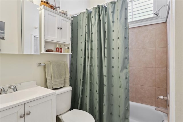 bathroom featuring toilet, vanity, and shower / bathtub combination with curtain