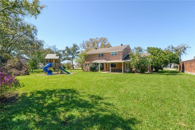 view of yard featuring a playground