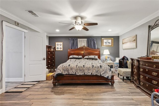 bedroom with visible vents, ornamental molding, recessed lighting, wood finished floors, and a ceiling fan