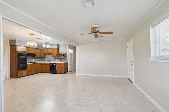 kitchen with visible vents, backsplash, stainless steel microwave, brown cabinets, and dobule oven black