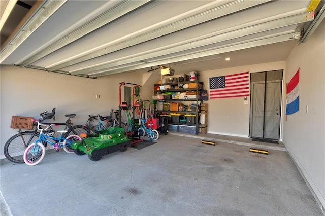 garage featuring baseboards