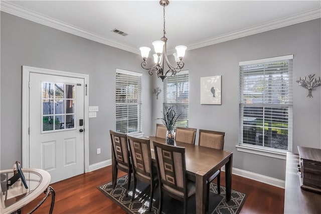 dining area with visible vents, baseboards, and dark wood-type flooring