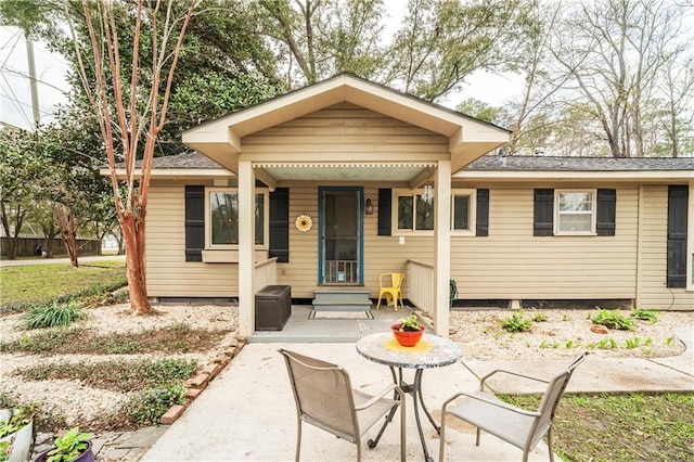 view of front of home with a patio area and entry steps