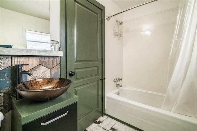 full bathroom featuring toilet, vanity, and shower / tub combo with curtain