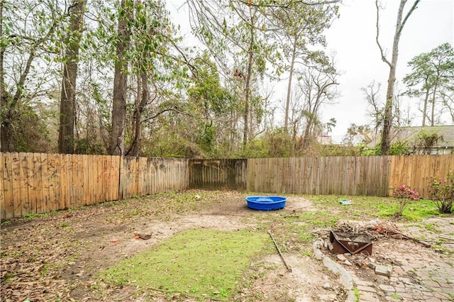 view of yard featuring a fenced backyard