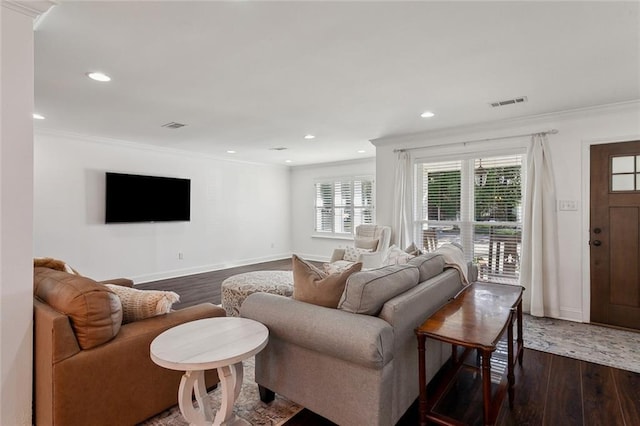 living room with visible vents, ornamental molding, dark wood finished floors, recessed lighting, and baseboards