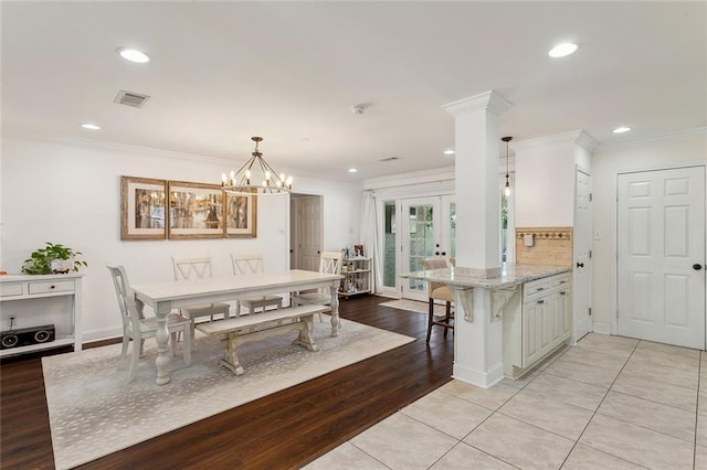 dining area with light tile patterned flooring, recessed lighting, baseboards, and ornamental molding