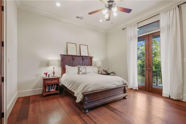 bedroom with visible vents, baseboards, recessed lighting, wood finished floors, and access to outside