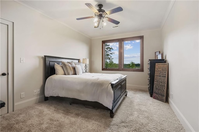 bedroom with light carpet, visible vents, and ornamental molding