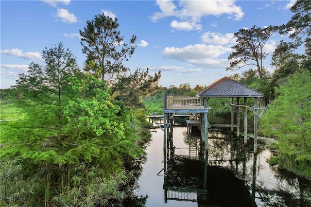 view of dock with a water view