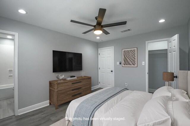 bedroom with a ceiling fan, wood finished floors, visible vents, baseboards, and recessed lighting