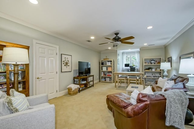 living room featuring baseboards, recessed lighting, ceiling fan, light carpet, and crown molding