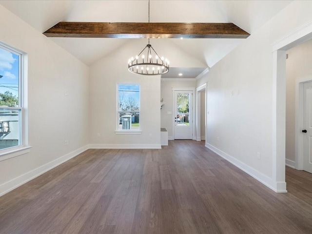 interior space featuring a notable chandelier, vaulted ceiling with beams, baseboards, and wood finished floors