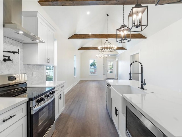 kitchen with electric stove, tasteful backsplash, wall chimney range hood, vaulted ceiling with beams, and light countertops