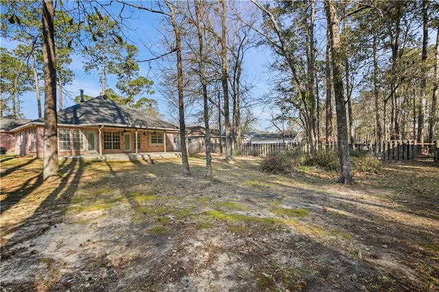 view of yard with fence