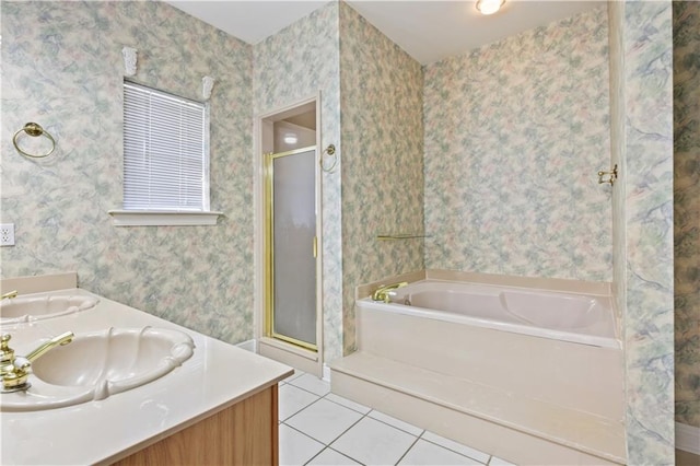 full bath featuring tile patterned flooring, a shower stall, wallpapered walls, and a sink