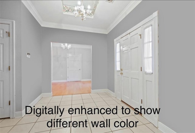 105 Cherokee Dr, Abita Springs, LA 70420 - foyer with a chandelier, tile patterned flooring, ornamental molding, and baseboards