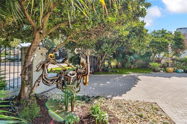 exterior space with a patio area and fence