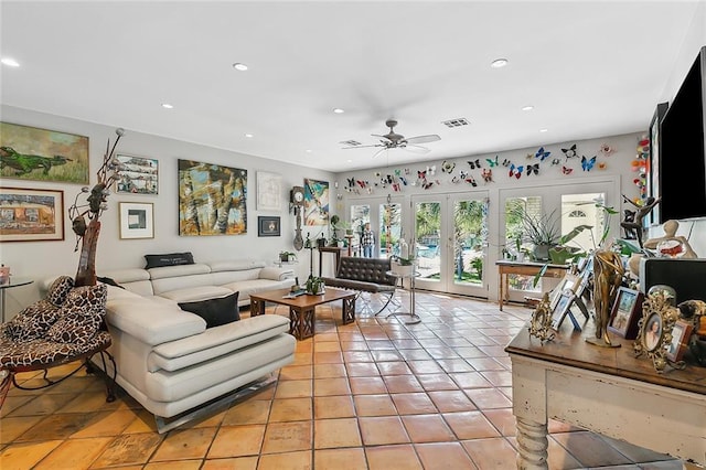 living room featuring recessed lighting, french doors, visible vents, and light tile patterned flooring