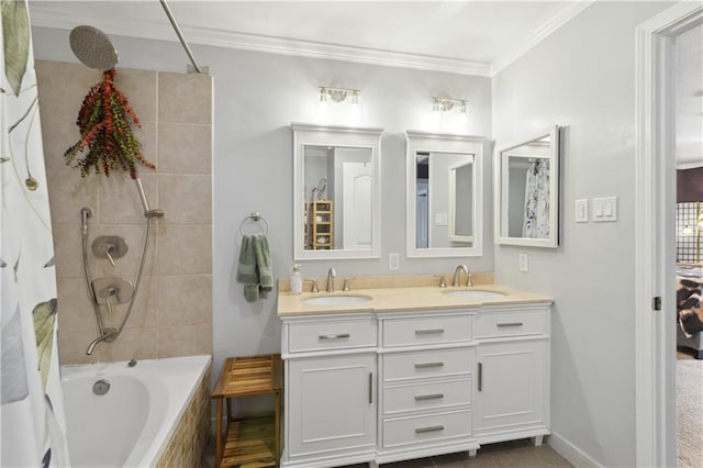 ensuite bathroom with ensuite bathroom, crown molding, tiled shower / bath combo, and a sink