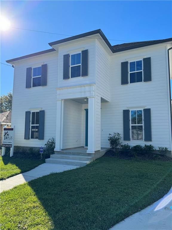 view of front of house featuring a front yard