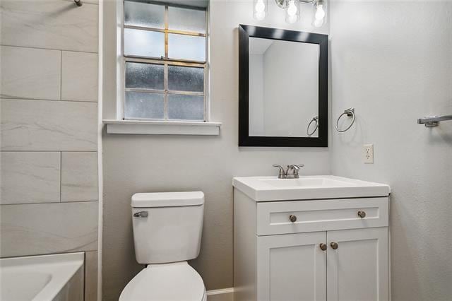 309 E 5th Ave, Covington, LA 70433 - full bath featuring vanity and toilet