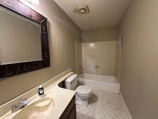 bathroom featuring vanity, washtub / shower combination, baseboards, tile patterned floors, and toilet