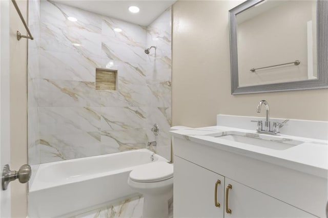 full bath featuring bathing tub / shower combination, marble finish floor, vanity, and toilet