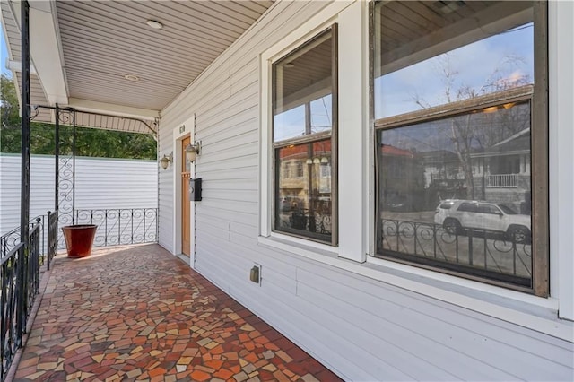 view of patio featuring a porch