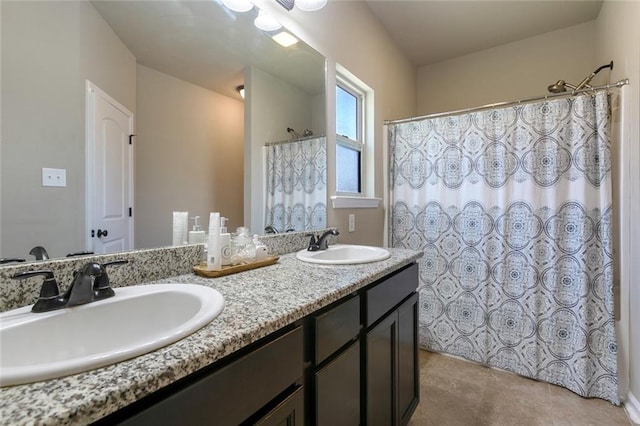 full bath featuring tile patterned flooring, double vanity, a shower with shower curtain, and a sink