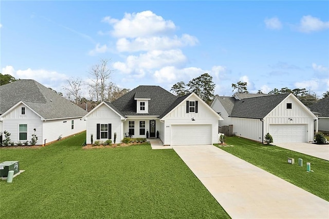 modern farmhouse featuring a garage, board and batten siding, a front lawn, and roof with shingles