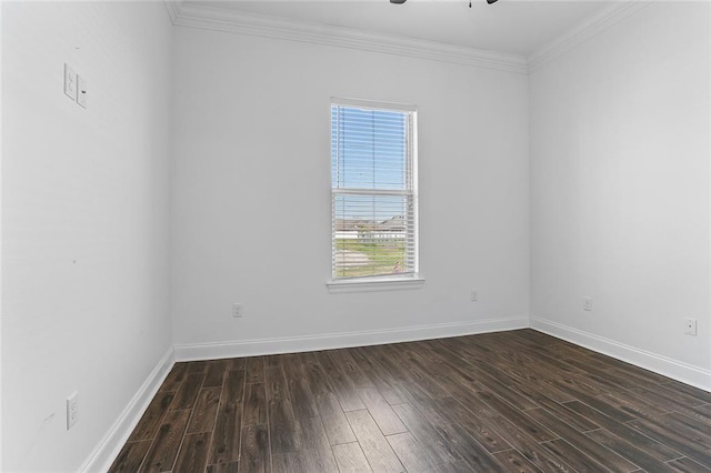 spare room with a ceiling fan, wood finished floors, baseboards, and ornamental molding