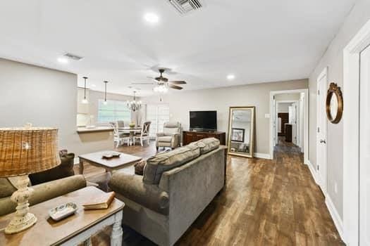 1913 Satsuma St, Metairie, LA 70001 - living area with a ceiling fan, dark wood-type flooring, recessed lighting, and baseboards