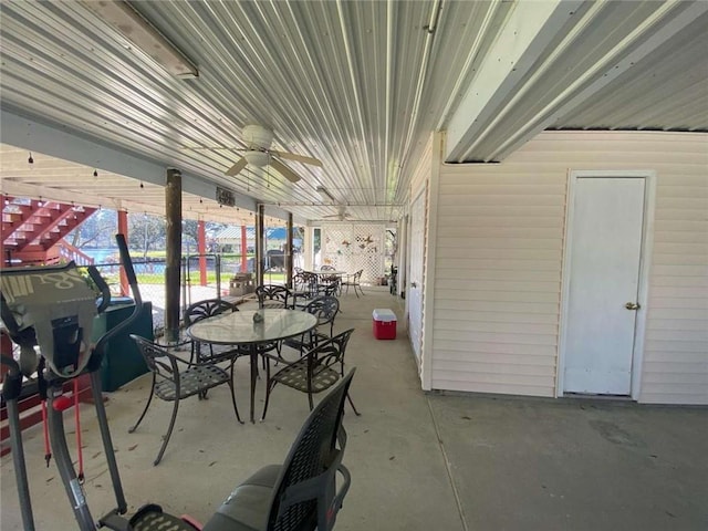 view of patio / terrace featuring outdoor dining area and a ceiling fan