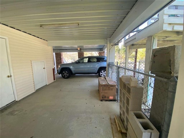 garage with an attached carport