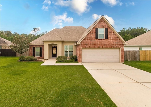 traditional-style home featuring a front yard, fence, roof with shingles, concrete driveway, and brick siding