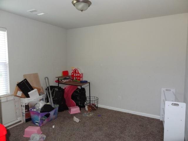 game room with baseboards, carpet floors, and visible vents