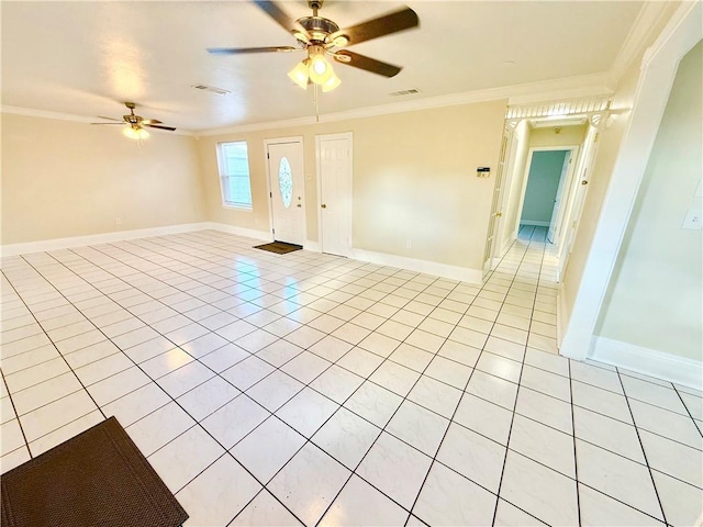 unfurnished living room with light tile patterned floors, visible vents, a ceiling fan, and ornamental molding