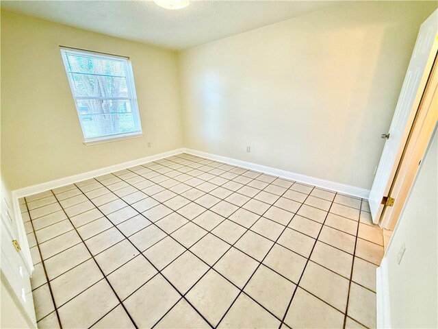 644 Willowbrook Dr, Gretna, LA 70056 - spare room featuring light tile patterned floors and baseboards