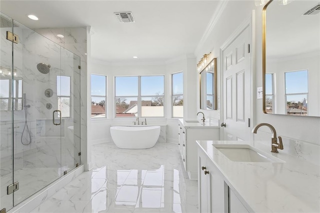 full bath featuring a soaking tub, visible vents, marble finish floor, and ornamental molding