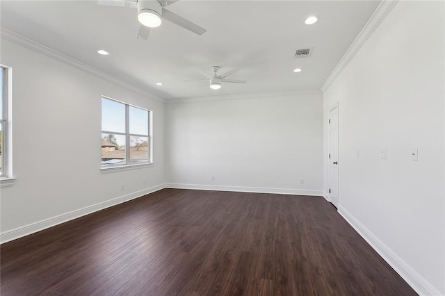 spare room featuring visible vents, baseboards, a ceiling fan, and crown molding