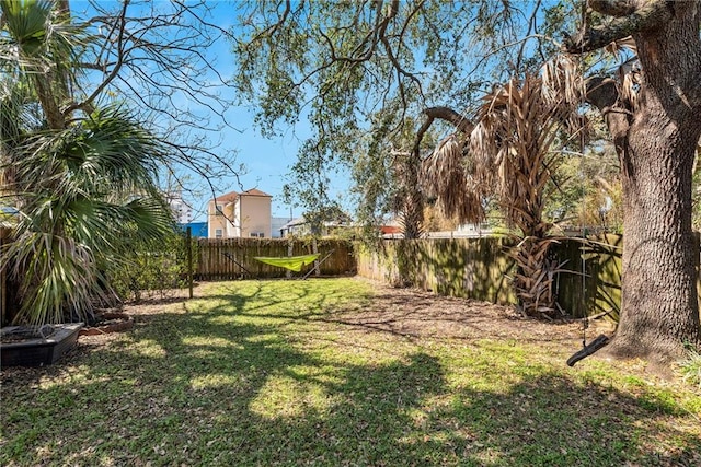 view of yard featuring a fenced backyard