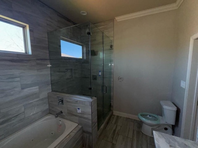 full bathroom with baseboards, a shower stall, crown molding, a jetted tub, and toilet