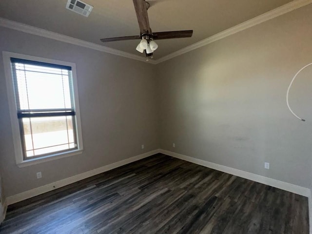 empty room featuring a ceiling fan, visible vents, dark wood-style flooring, and ornamental molding