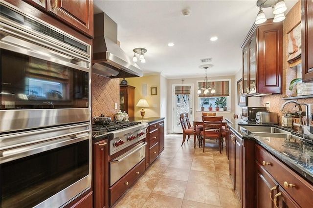 kitchen with stainless steel double oven, glass insert cabinets, backsplash, and island range hood