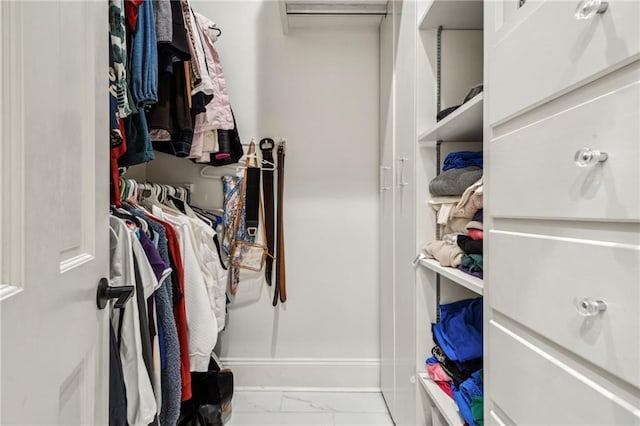4533 N Turnbull Dr, Metairie, LA 70002 - walk in closet featuring marble finish floor