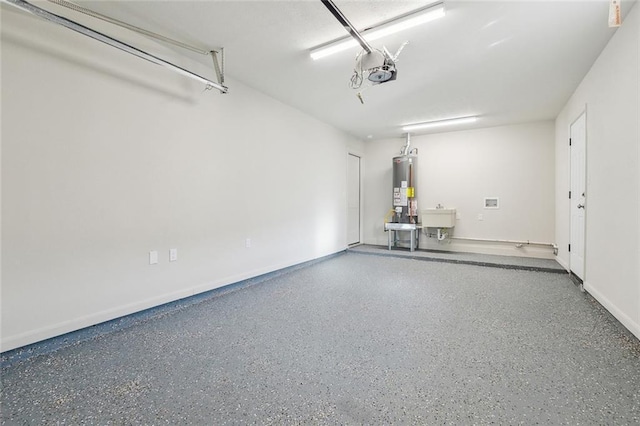 garage with a sink, gas water heater, and a garage door opener