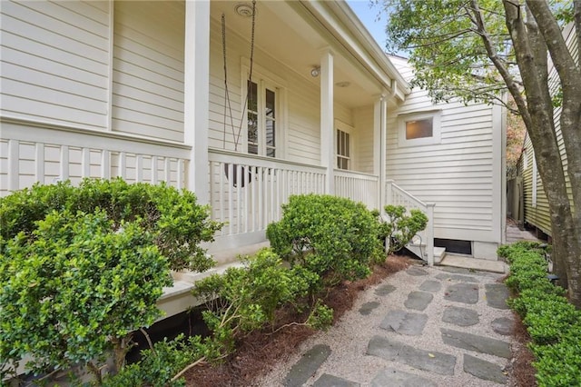 view of patio featuring a porch