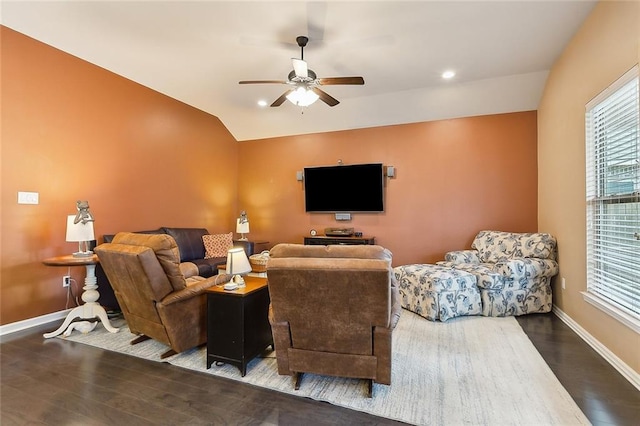 living room featuring wood finished floors, recessed lighting, baseboards, ceiling fan, and vaulted ceiling