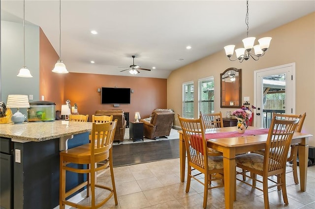 dining room featuring light tile patterned floors, ceiling fan with notable chandelier, and recessed lighting